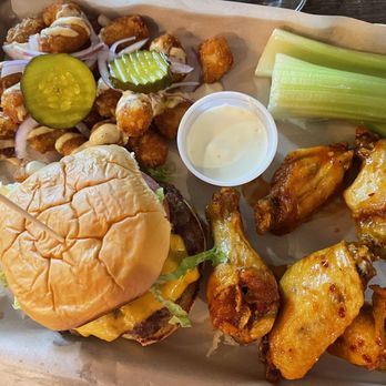 McCall Collective Brewing signature dishes McCall Burger, Brisket Cheesesteak, Nashville Hot Chicken, Spent Grain Pretzels